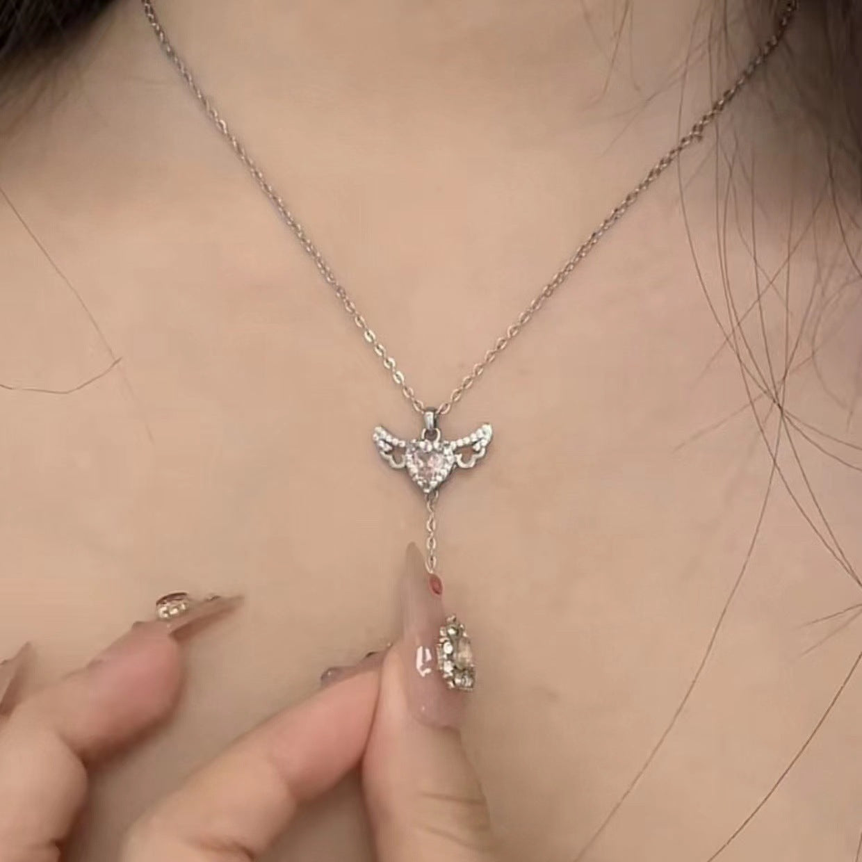 Moving Cupid Heart Necklace